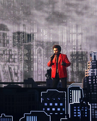 The Weeknd performs at the Pepsi Halftime Show during the NFL Super Bowl 55 football game between the Kansas City Chiefs and Tampa Bay Buccaneers, Sunday, Feb. 7, 2021 in Tampa, Fla. (Ben Liebenberg via AP)