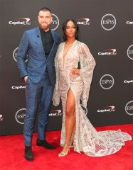 Kansas City Chiefs' Travis Kelce, left, and Kayla Nicole arrive at the ESPY Awards at Microsoft Theater on Wednesday, July 18, 2018, in Los Angeles. (Photo by Willy Sanjuan/Invision/AP)