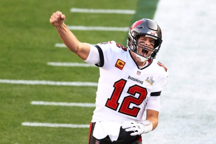 Tampa Bay Buccaneers quarterback Tom Brady shouts after running on to the field before the NFL Super Bowl 55 football game between the Kansas City Chiefs and Tampa Bay Buccaneers, Sunday, Feb. 7, 2021, in Tampa, Fla. (AP Photo/Mark LoMoglio)