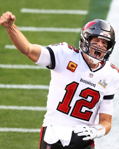 Tampa Bay Buccaneers quarterback Tom Brady shouts after running on to the field before the NFL Super Bowl 55 football game between the Kansas City Chiefs and Tampa Bay Buccaneers, Sunday, Feb. 7, 2021, in Tampa, Fla. (AP Photo/Mark LoMoglio)