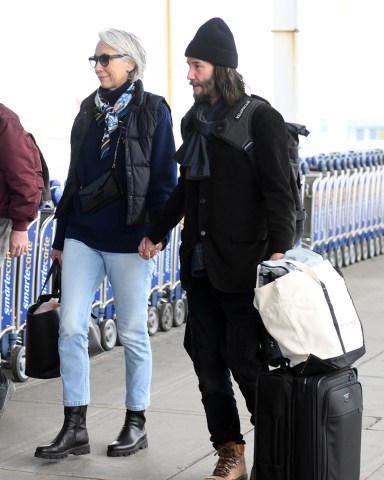 Keanu Reeves and his girlfriend Alexandra Grant holding hands while arriving at JFK International Airport in New York City

Pictured: Keanu Reeves,Alexandra Grant
Ref: SPL5596698 280423 NON-EXCLUSIVE
Picture by: Elder Ordonez / SplashNews.com

Splash News and Pictures
USA: +1 310-525-5808
London: +44 (0)20 8126 1009
Berlin: +49 175 3764 166
photodesk@splashnews.com

World Rights, No Poland Rights, No Portugal Rights, No Russia Rights