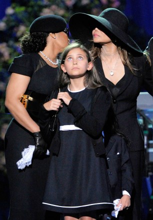 Janet Jackson, Paris Jackson, La Toya Jackson, Randy Jackson, Prince Michael I. Janet Jackson, left, and sister LaToya Jackson, stand behind Michael Jackson's daughter Paris Jackson on stage during the memorial service for Michael Jackson at the Staples Center in Los Angeles
Michael Jackson, Los Angeles, USA - 7 Jul 2009