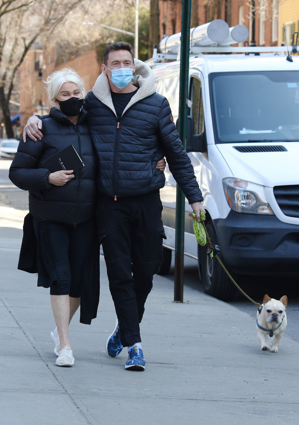 Hugh Jackman and Deborra-Lee Furness are all smiles while out with their dog Dali around Manhattan’s Downtown area. 10 Mar 2021 Pictured: Hugh Jackman and Deborra-Lee Furness. Photo credit: LRNYC / MEGA TheMegaAgency.com +1 888 505 6342 (Mega Agency TagID: MEGA738569_001.jpg) [Photo via Mega Agency]