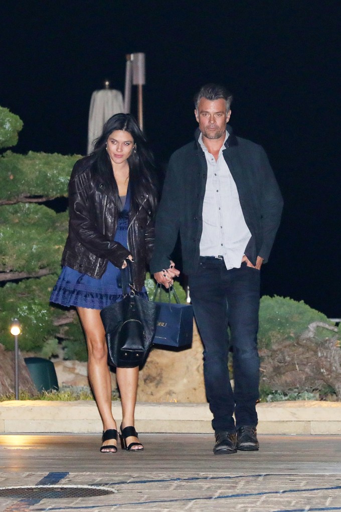 Josh Duhamel & Audra Mari hand in hand