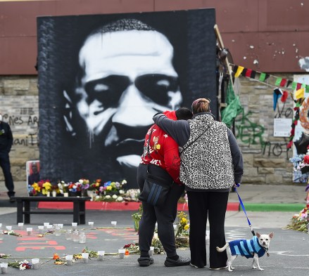 A couple pause for a moment in front of a portrait of George Floyd on the second day of deliberations for the murder trial of former Minneapolis police officer Derek Chauvin who was charged in the death of George Floyd are being held, in Minneapolis, Minnesota, USA, 20 April 2021.
Derek Chauvin Trial, Minneapolis, USA - 20 Apr 2021