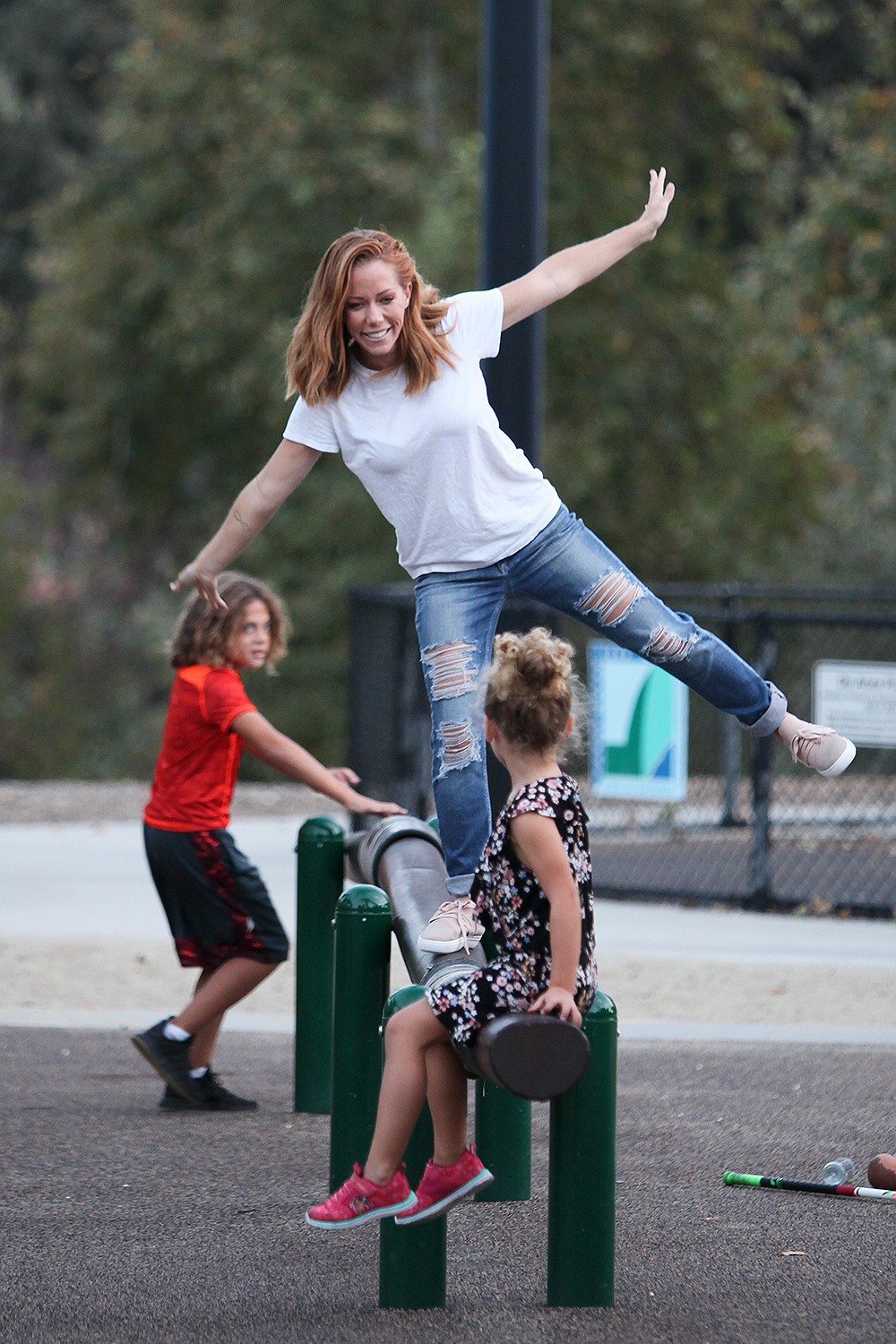 EXCLUSIVE: Kendra Wilkinson playing with her kids Alijah and Hank Baskett at the park