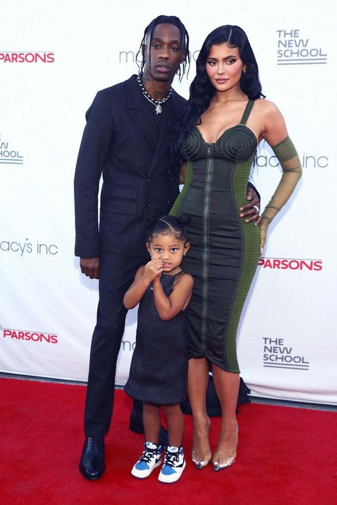 Kylie Jenner, Travis Scott & Stormi posing