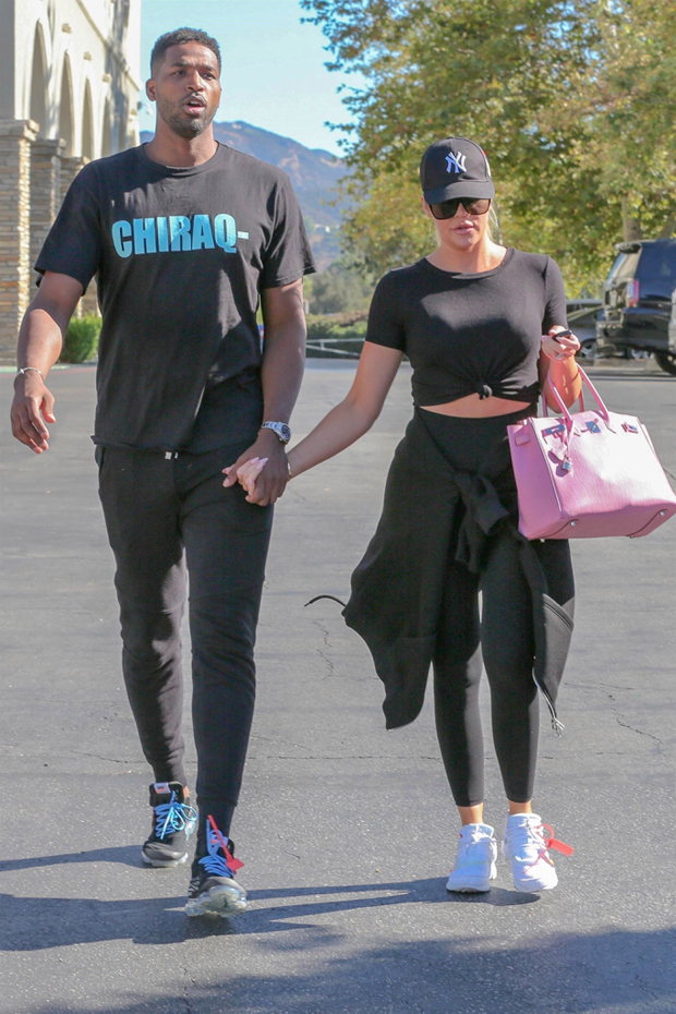 Calabasas, CA - *EXCLUSIVE* - Khloe Kardashian and Tristan Thompson go on a movie date, to see "White Boy Rick", on a sunny Sunday afternoon. The happy couple dress for comfort, wearing mostly black gym clothes, and Nike shoes. Khloe adds a pop of color with a bright pink purse.Pictured: Khloe Kardashian, Tristan Thompson BACKGRID USA 16 SEPTEMBER 2018 USA: +1 310 798 9111 / usasales@backgrid.com UK: +44 208 344 2007 / uksales@backgrid.com *UK Clients - Pictures Containing Children Please Pixelate Face Prior To Publication*