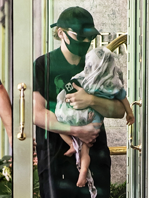Rupert Grint and his newborn