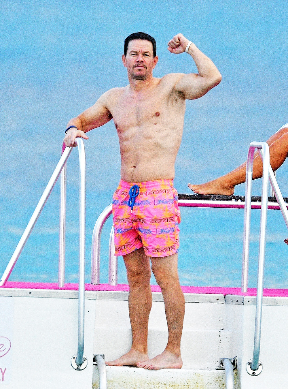 *EXCLUSIVE* Mark Wahlberg's beach figure steals the spotlight while on a family holiday in Barbados.