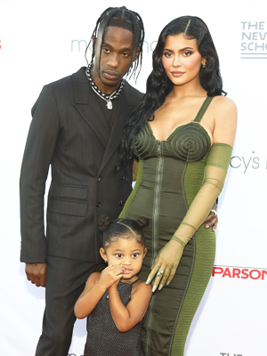Kylie Jenner with Travis Scott and Stormi.