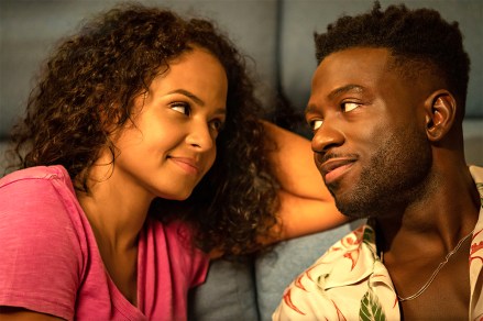 Resort to Love.  Christina Milian as Erica Wilson, Sinqua Walls as Caleb King in Resort to Love.  Cr. David Bloomer/ NETFLIX © 2020