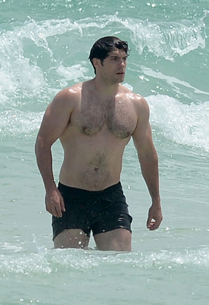 Henry Cavill walks in the water