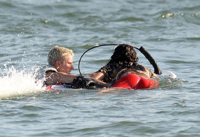 Justin Bieber catching waves