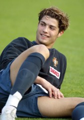 Portuguese Soccer Player of Manchester United Cristiano Ronaldo Smiles During the Portuguese Soccer Team Training on Monday 16 February 2004 at the Nacional Stadium in Lisbon Ahead of Their Friendly Game on Wednesday Against England Portugal LisbonPortugal Soccer Training - Feb 2004