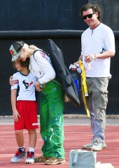 EXCLUSIVE: Gwen Stefani and Gavin Rossdale have a rare co-parenting bonding moment together at the end of Apollo's flag football game while both consoling their youngest son after his team suffered a tough loss in Los Angeles on Sunday. Gwen went to the game solo without Blake Shelton and sat in the stands with other parents while Gavin rooted from the sidelines with his girlfriend Courtlyn Cannan who he brought to the game. They ignored each other the whole game until after the match when they both wanted to console their crying son Apollo who was upset about losing his flag football contest. 16 Oct 2022 Pictured: Gwen Stefani and Gavin Rossdale having a co-parenting bonding moment together at the end of Apollo's football game. Photo credit: Garrett Press / MEGA TheMegaAgency.com +1 888 505 6342 (Mega Agency TagID: MEGA908631_001.jpg) [Photo via Mega Agency]