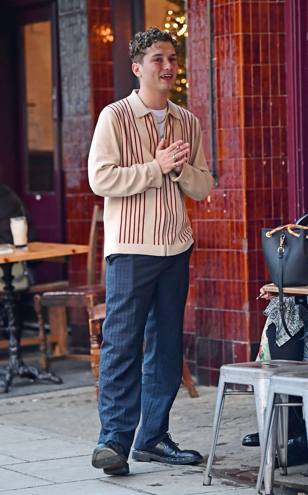 *EXCLUSIVE* British actor Jude Law's son Rafferty Law pictured enjoying a smoke with friends at celebrity-owned London pub The Walmer Castle which is co-owned by former footballer David Beckham and film director Guy Ritchie in Notting Hill.