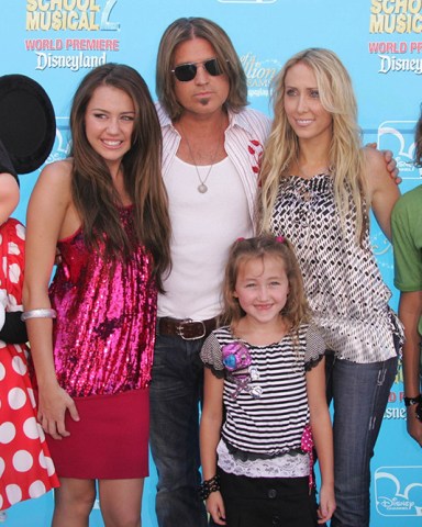 Minnie Mouse, Miley Cyrus, Billy Ray Cyrus and family 
'High School Musical 2' film premiere, Anaheim, America - 14 Aug 2007
Minnie Mouse, Miley Cyrus, Billy Ray Cyrus and family 
World Premiere of 'High School Musical 2' at Disneyland Resort in Anaheim, California on August 14, 2007 .

Anaheim, California 

Photo ® Matt Baron/BEImages