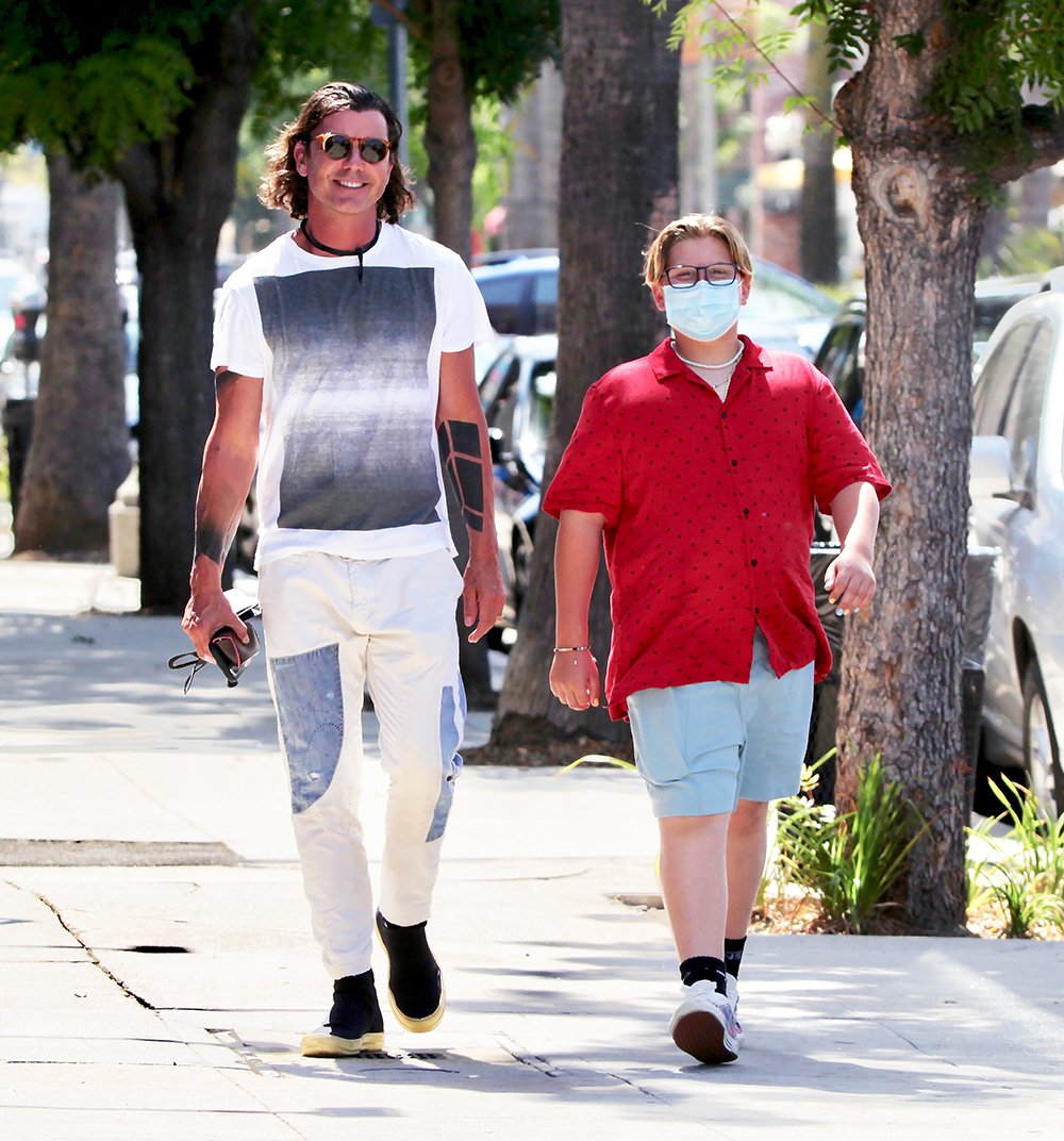 EXCLUSIVE: Gavin Rossdale is all smiles spending quality time with his son Zuma along trendy Melrose Ave. in West Hollywood