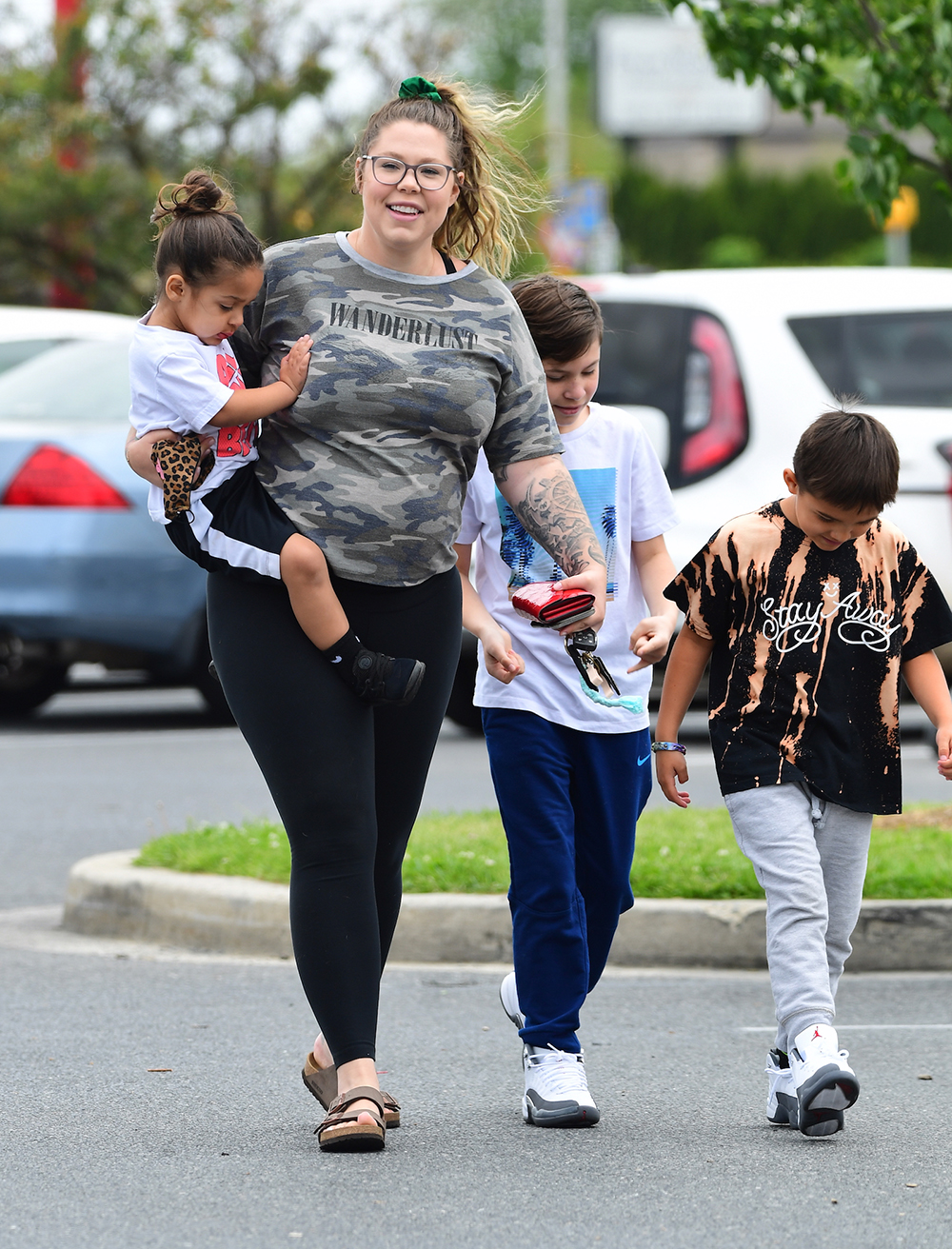 EXCLUSIVE: Pregnant Teen Mom Star Kailyn Lowry was spotted out in Delaware , shopping at Target with her three children . She showed off her baby bump with only a few weeks until the birth. She smiled as she walked into the store. Kaitlyn plans to raise all of her kids as a single mom following a split from her partner. They remained in the store for 20 minutes while the kids picked out water guns, while she bought a large pack of diapers to prepare for the baby's arrival . 10 Jun 2020 Pictured: Kailyn Lowry ,Lux Lowry, Isaac Rivera, Lincoln Marroquin. Photo credit: MEGA TheMegaAgency.com +1 888 505 6342 (Mega Agency TagID: MEGA679366_001.jpg) [Photo via Mega Agency]