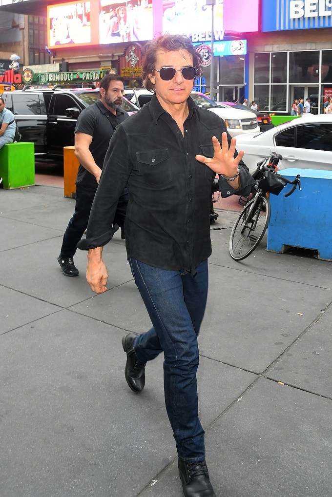 *EXCLUSIVE* Was Suri invited? Tom Cruise arrives at AMC in Times Square with son Connor and sister Lee.