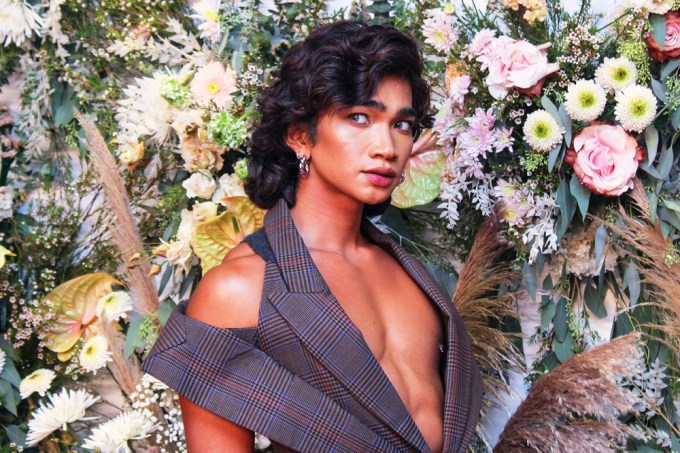 Bretman Rock poses