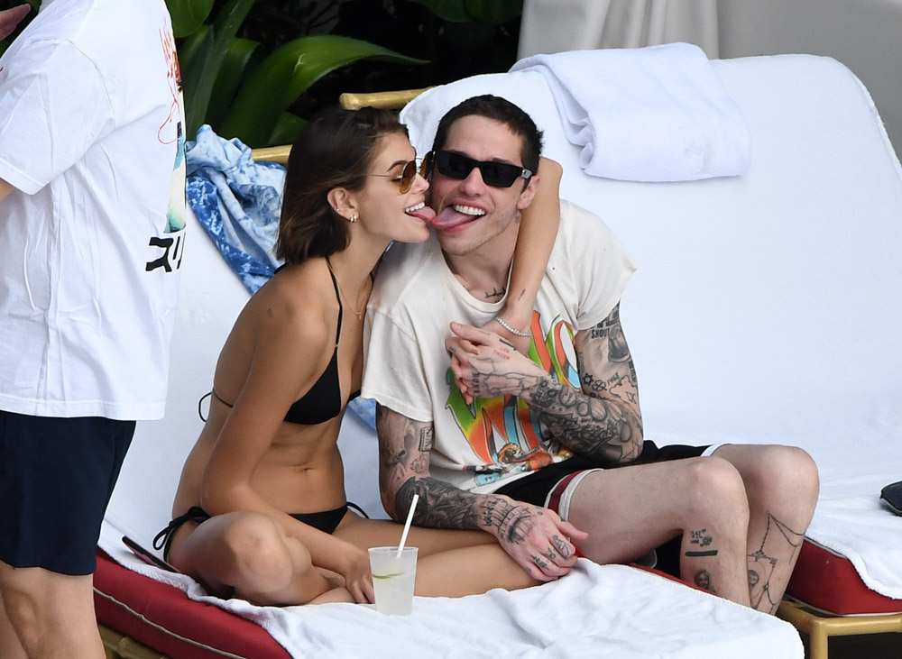 Kaia Gerber and Pete Davidson can't keep their tongues in their mouths as they make out nonstop in full view of all their friends at the pool in Miami