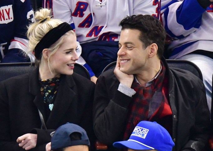 Rami Malek & Lucy Boynton At An NHL Game