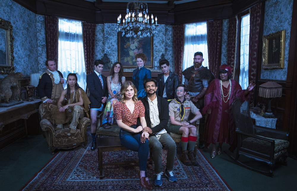 GHOSTS is a single-camera comedy about Samantha and Jay, a cheerful freelance journalist and up-and-coming chef from the city, respectively, who throw both caution and money to the wind when they decide to convert a huge rundown country estate they inherited into a bed & breakfast--only to find it's inhabited by the many spirits of deceased residents who now call it home. GHOSTS on the special one-hour series premiere of the new CBS Original comedy GHOSTS, Thursday, Oct. 7 (9:01-10:00 PM, ET/PT) on the CBS Television Network, and available to stream live and on demand on Paramount+.     Pictured (L-R Front Row)  Rose McIver as Samantha and Utkarsh Ambudkar   Pictured (L-R Back Row ) Brandon Scott Jones as Isaac, Romn Zaragoza as Sasappis, Asher Grodman as Trevor,  Sheila Carrasco as Flower, Rebecca Wisocky as Hetty, Hudson Thames as Crash, Richie Moriarty as Pete,  Devan Chandler Long as Thorfinn and Danielle Pinnock as Alberta       Photo: Cliff Lipson/CBS 2020 CBS Broadcasting, Inc. All Rights Reserved.