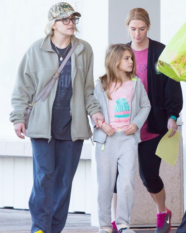 EXCLUSIVE: Jamie Lynn Spears' daughter Maddie Aldridge leaves hospital after her miraculous recovery from a near-fatal ATV accident. Maddie, who has visible bruising on her neck, clutched entertainer mom Jamie Lynn's hand as they left New Orleans Children's Hospital on Friday afternoon. The eight-year old was airlifted to hospital after being resuscitated by ambulance crews. Maddie's father, Jamie Watson as well as grandparents, Jamie and Lynne Spears, were also on hand. Maddie. There was no sign of Maddie's aunt, pop star Britney Spears. 10 Feb 2017 Pictured: Jamie Lynn Spears, Maddie Aldridge. Photo credit: MEGA TheMegaAgency.com +1 888 505 6342 (Mega Agency TagID: MEGA16884_015.jpg) [Photo via Mega Agency]