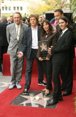 Eric Idle, Paul McCartney, Olivia Harrison, Dhani Harrison and T
George Harrison Honoured with a Star on the Hollywood Walk of Fame in Los Angeles, California, America - 14 Apr 2009
A star was laid on the Hollywood Walk of Fame in honour of the Fab Four’s deceased guitarist, George Harrison.

Friends and family who helped to unveil the commemorative star came in the form of his widow and son, Olivia and Dhani Harrison, as well as former band mates Sir Paul McCartney, Tom Petty and Jeff Lynne

Also reflecting his later career as a film producer, guests attending from the film industry included Eric Idle, Tom Hanks and his wife Rita Wilson. Ringo Starr did not attend.