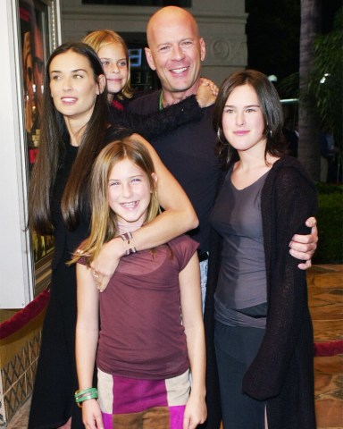 MOORE Actors Bruce Willis, center, Demi Moore, left, and their children, Rumer, Scout and Tallulah, arrive at the premiere of "Bandits", in the Westwood section of Los Angeles
BANDITS PREMIERE, LOS ANGELES, USA