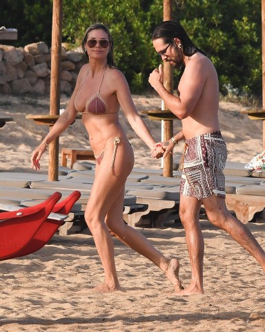 Sardegna, ITALY  - The German Supermodel Heidi Klum and her husband, the Tokio Hotel star Tom Kaulitz frolic out in the sea during the sun-soaked holiday at the beaches of Cala Volpe bay in Sardinia.

The couple packed on the PDA during the European heatwave that's currently gripping in the continent.

Pictured: Heidi Klum - Tom Kaulitz

BACKGRID USA 16 JULY 2023 

BYLINE MUST READ: Frezza La Fata - Cobra Team / BACKGRID

USA: +1 310 798 9111 / usasales@backgrid.com

UK: +44 208 344 2007 / uksales@backgrid.com

*UK Clients - Pictures Containing Children
Please Pixelate Face Prior To Publication*