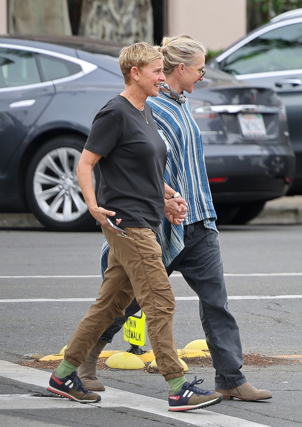 Santa Barbara, CA  - *EXCLUSIVE*  - Comedian Ellen Degeneres and actress Portia De Rossi can't contain their laughter as the happy couple pack on the PDA during a Santa Barbara stroll.

Pictured: Ellen Degeneres, Portia De Rossi

BACKGRID USA 15 OCTOBER 2022 

USA: +1 310 798 9111 / usasales@backgrid.com

UK: +44 208 344 2007 / uksales@backgrid.com

*UK Clients - Pictures Containing Children
Please Pixelate Face Prior To Publication*