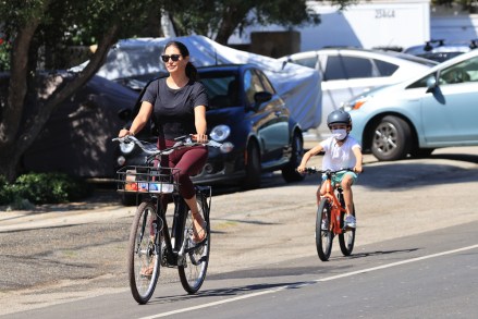 EXCLUSIVE: Simon Cowell’s partner Lauren Silverman enjoys a bike ride with her sons Eric and Adam in Malibu. 08 Aug 2020 Pictured: Lauren Silverman enjoys a bike ride with her sons. Photo credit: Rachpoot/MEGA TheMegaAgency.com +1 888 505 6342 (Mega Agency TagID: MEGA693253_003.jpg) [Photo via Mega Agency]