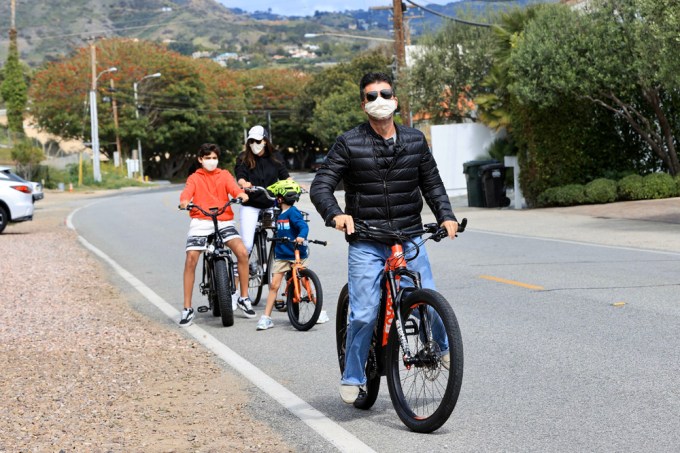 Simon Cowell & Lauren Silverman Ride Bikes