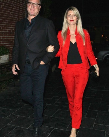 Los Angeles, CA  - *EXCLUSIVE*  - Comedian Bob Saget and his girlfriend Kelly Rizzo were spotted heading to a dinner date at Avenue during a night out in Los Angeles. Kelly brightened up the couple's look with a bright red pantsuit.

Pictured: Bob Saget, Kelly Rizzo

BACKGRID USA 5 APRIL 2018 

BYLINE MUST READ: Yolo / BACKGRID

USA: +1 310 798 9111 / usasales@backgrid.com

UK: +44 208 344 2007 / uksales@backgrid.com

*UK Clients - Pictures Containing Children
Please Pixelate Face Prior To Publication*