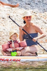 Saint-Tropez, FRANCE - *EXCLUSIVE* - Katy Perry, her fiancé Orlando Bloom, their daughter Daisy Dove and Orlando's son, Flynn Christopher make the most of their vacation on a yacht and on a pebble beach in the Gulf of Saint-Tropez, Côte d'Azur. On the program: swimming, sunbathing, and paddling. The couple kiss tenderly while swimming. Shot ono 7/18/23 Pictured: Katy Perry, Orlando Bloom BACKGRID USA 25 JULY 2023 BYLINE MUST READ: Best Image / BACKGRID USA: +1 310 798 9111 / usasales@backgrid.com UK: +44 208 344 2007 / uksales@backgrid.com *UK Clients - Pictures Containing Children Please Pixelate Face Prior To Publication*