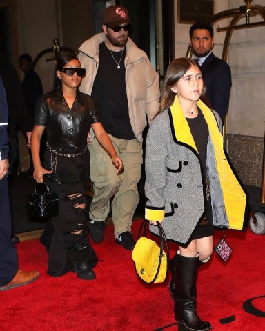 New York, NY  - North West, Penelope & Scott Disick step out in the rain in NYC all dressed in Chanel.Pictured: Scott Disick, North West, Penelope DisickBACKGRID USA 30 APRIL 2023 USA: +1 310 798 9111 / usasales@backgrid.comUK: +44 208 344 2007 / uksales@backgrid.com*UK Clients - Pictures Containing ChildrenPlease Pixelate Face Prior To Publication*