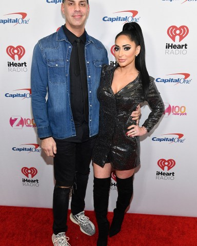 Angelina Pivarnick, Chris Larangeira. Chris Larangeira and Angelina Pivarnick attend Z100's iHeartRadio Jingle Ball at Madison Square Garden, in New York
2019 Jingle Ball - - Arrivals, New York, USA - 13 Dec 2019