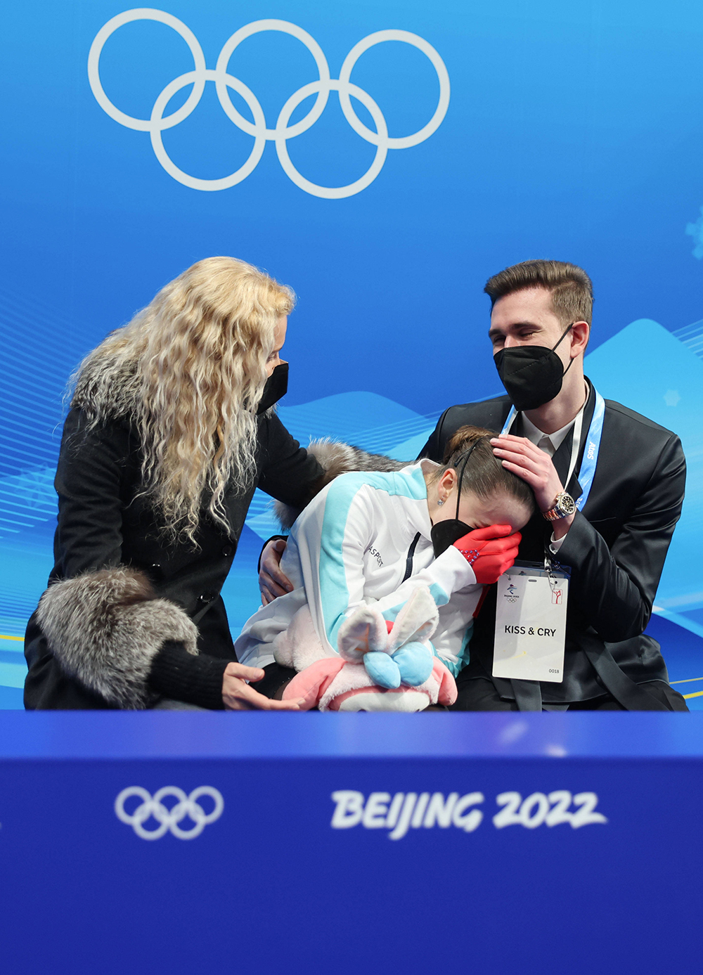 (220217) - BEIJING, Feb. 17, 2022 (Xinhua) - Kamila Valieva (C) of ROC reacts during the figure skating women single skating free skating of the Beijing 2022 Winter Olympics at Capital Indoor Stadium in Beijing, capital of China, Feb. 17, 2022.China Beijing Olympic Winter Games Figure Skating Women Single Skating Free Skating - 17 Feb 2022