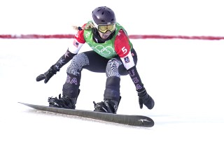 (220209) - ZHANGJIAKOU, Feb. 9, 2022 (Xinhua) - Lindsey Jacobellis of the United States crosses the finish line during the women's snowboard cross final of the Beijing 2022 Winter Olympics at Genting Snow Park in Zhangjiakou, North China's Hebei Province, Feb. 9, 2022.
China Zhangjiakou Women's Snowboarding Cross Final - 09 Feb 2022