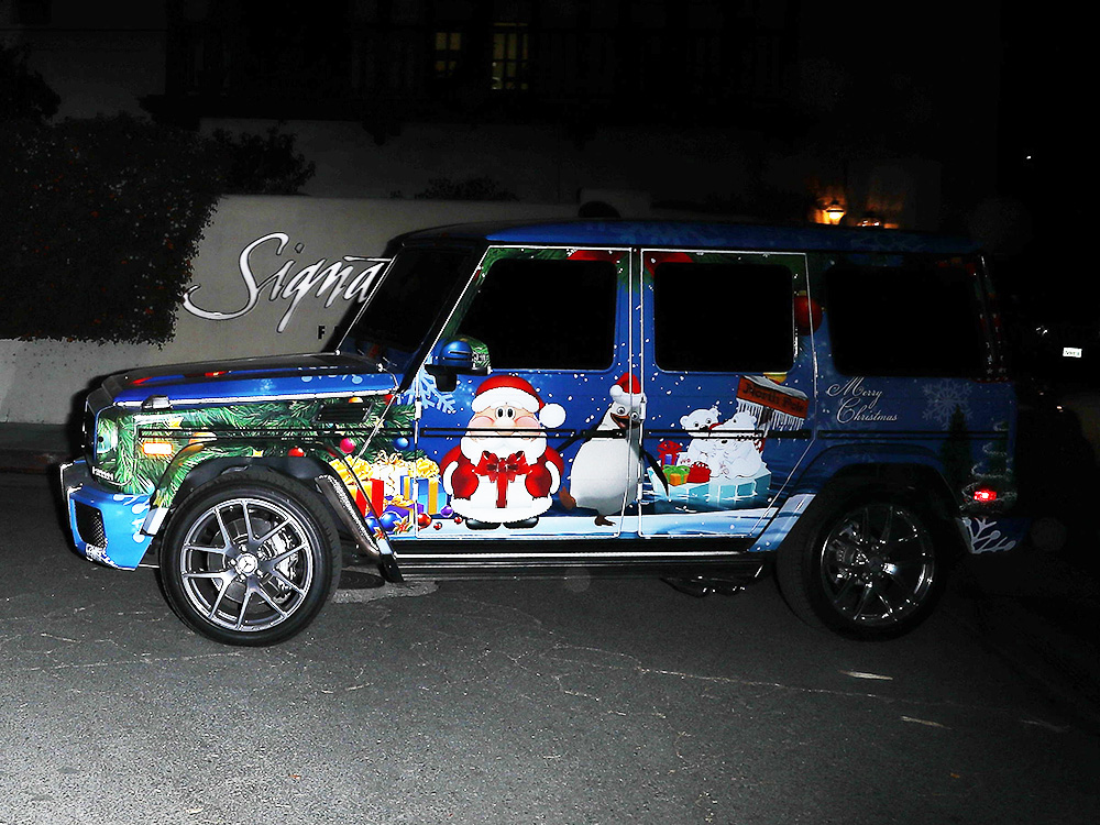 Justin Bieber drives out of Van Nuys airport after arriving back from Seattle in Los Angeles, CA christmas car