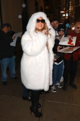 New York, NY  - Mariah Carey signs autographs for her fans as she heads to Madison Square Garden for her Christmas concert.

Pictured: Mariah Carey

BACKGRID USA 16 DECEMBER 2022 

BYLINE MUST READ: T.JACKSON / BACKGRID

USA: +1 310 798 9111 / usasales@backgrid.com

UK: +44 208 344 2007 / uksales@backgrid.com

*UK Clients - Pictures Containing Children
Please Pixelate Face Prior To Publication*