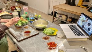 A couple makes sushi at home