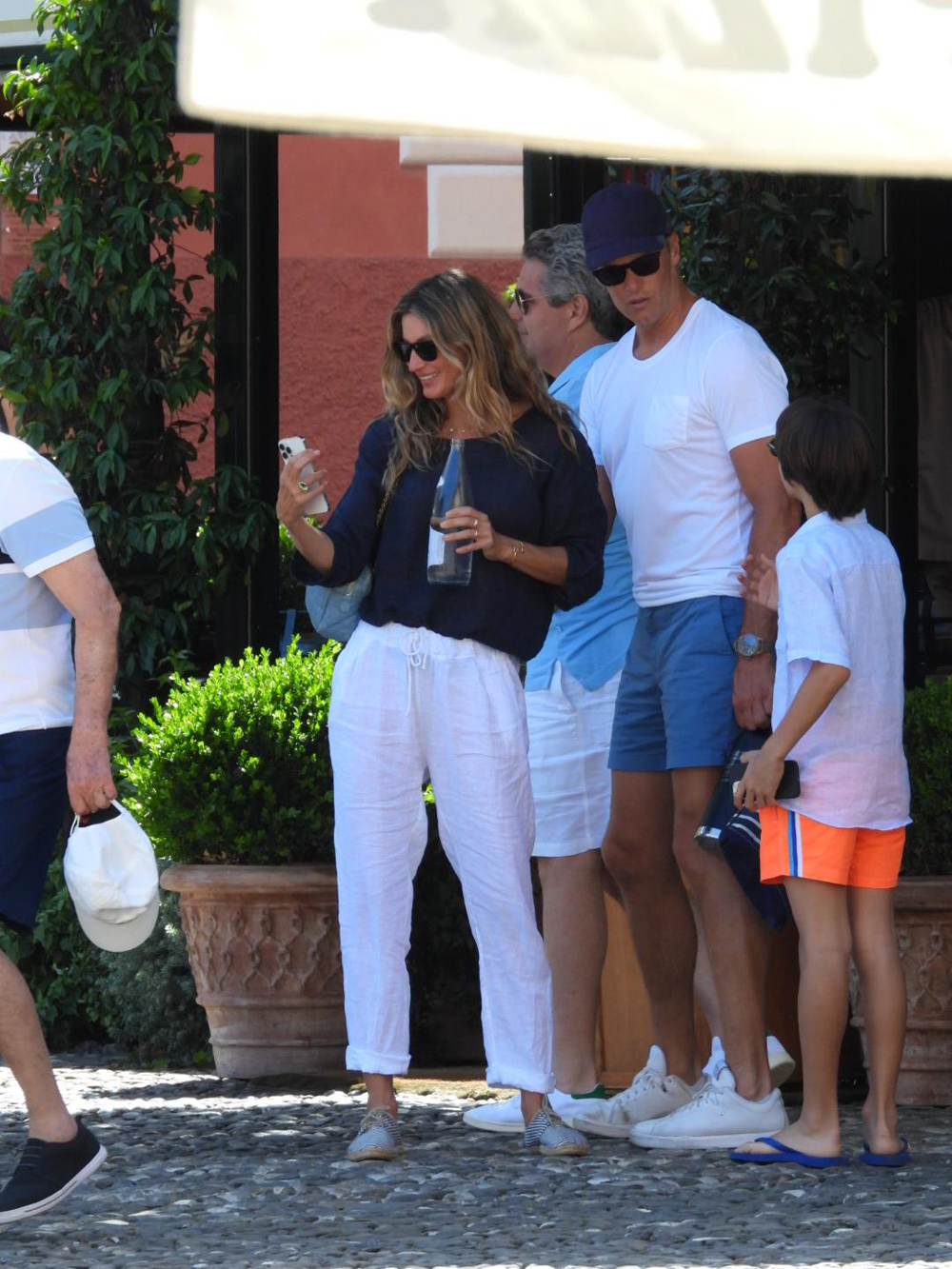 Gisele Bundchen and Tom Brady seen doing some shopping and getting an ice-cream in Portofino with their children Benjamin Rein and John Edward Thomas Moynahan. 29 Jun 2022 Pictured: Gisele Bundchen, Tom Brady, Vivien Lake Brady. Photo credit: Oliver Palombi / MEGA TheMegaAgency.com +1 888 505 6342 (Mega Agency TagID: MEGA873314_001.jpg) [Photo via Mega Agency]