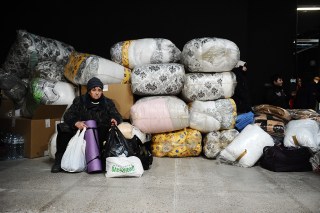 Refugees from Ukraine come to the Polish capital every day. Some want to stay in Poland and others plan to go to Western Europe. Refugees wait at train stations and at temporary accommodation points before they leave.
Temporary accommodation for ten thousand refugees has been created at the Ptak Warsaw Expo fair.
Refugees from Ukraine, Poland - 09 Mar 2022