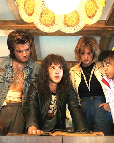 STRANGER THINGS. (L to R) Natalia Dyer as Nancy Wheeler, Gaten Matarazzo as Dustin Henderson, Joe Keery as Steve Harrington, Joseph Quinn as Eddie Munson, Maya Hawke as Robin Buckley, Priah Ferguson as Erica Sinclair, Sadie Sink as Max Mayfield, and Caleb McLaughlin as Lucas Sinclair in STRANGER THINGS. Cr. Courtesy of Netflix © 2022