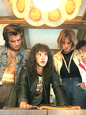 STRANGER THINGS. (L to R) Natalia Dyer as Nancy Wheeler, Gaten Matarazzo as Dustin Henderson, Joe Keery as Steve Harrington, Joseph Quinn as Eddie Munson, Maya Hawke as Robin Buckley, Priah Ferguson as Erica Sinclair, Sadie Sink as Max Mayfield, and Caleb McLaughlin as Lucas Sinclair in STRANGER THINGS. Cr. Courtesy of Netflix © 2022