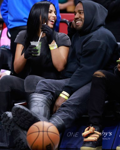 Rapper Kanye West and girlfriend Chaney Jones attend a game between the Miami Heat and the Minnesota Timberwolves at FTX Arena
Celebrities at Miami Heat v Minnesota Timberwolves, Basketball at FTX Arena, Miami, Florida, USA - 12 Mar 2022